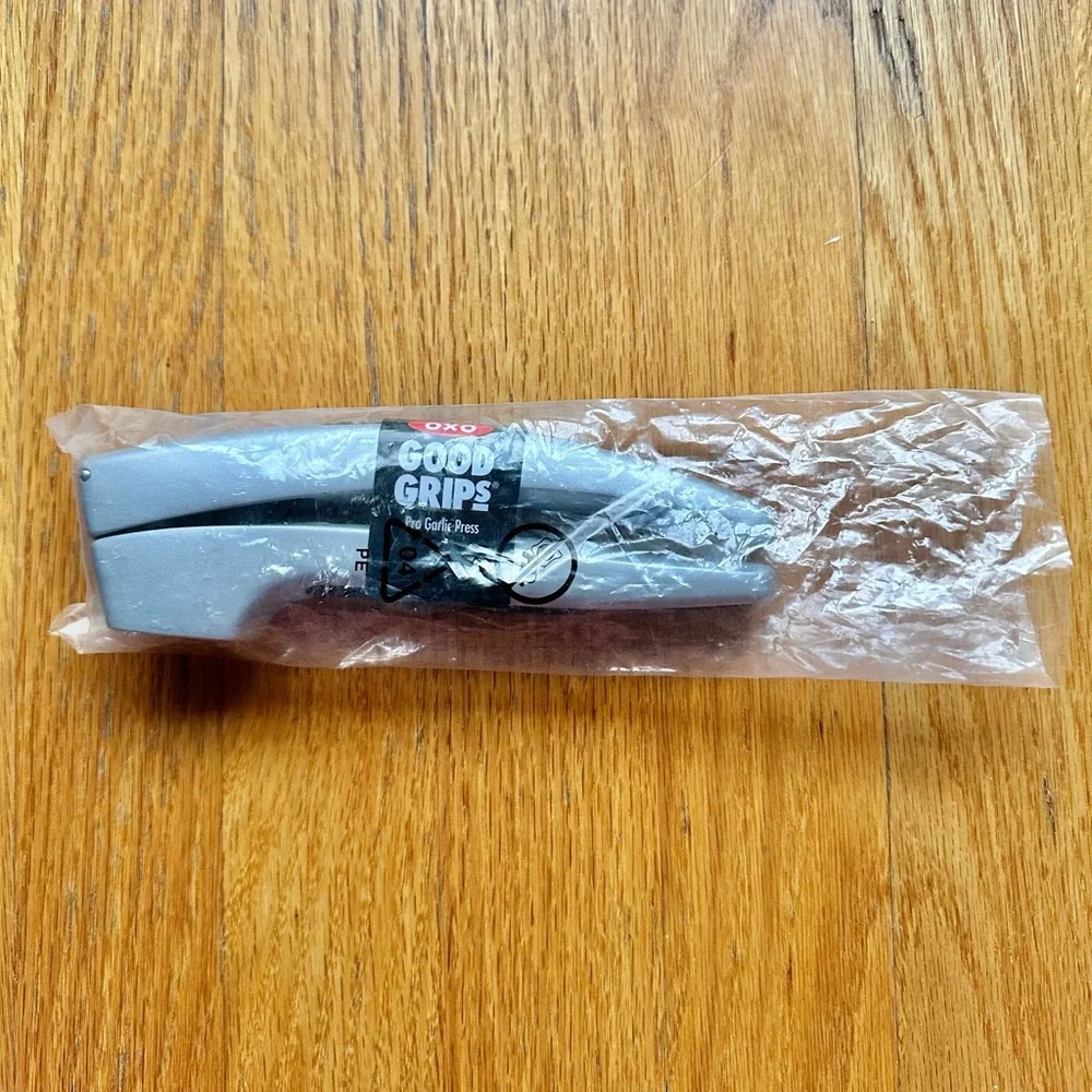 NEW OXO Garlic Press